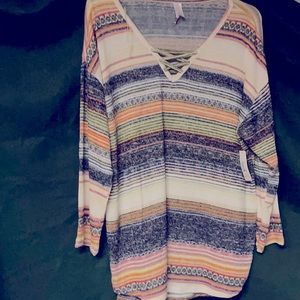 I’m selling a multicolored blouse.